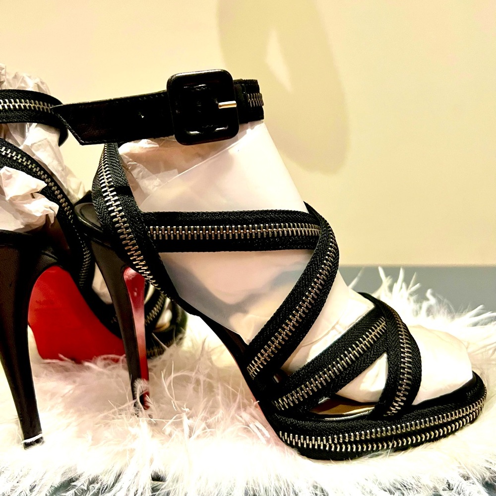 Christian Louboutin size 39 black zipper detailed strappy pumps.